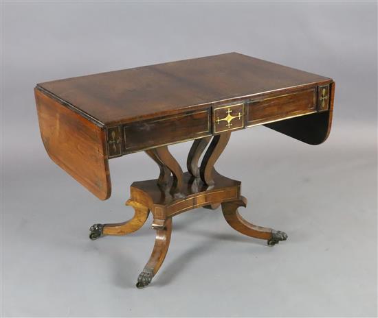 A Regency brass inset rosewood sofa table, W.3ft 3in. D.2ft 2in. H.2ft 4in.
